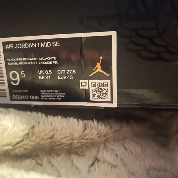Christmas Jordan 1 they are red,black,and white with green laces and gum bottoms